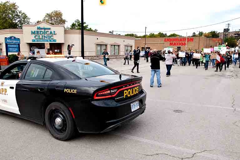 Orillia OPP letting demonstrators take over the street for the last leg of the march.