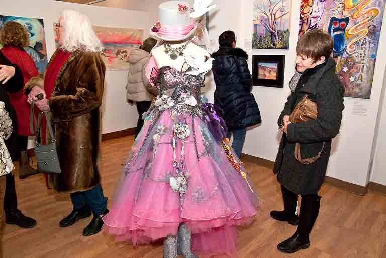 How many artists does it take to make a dress? 11.