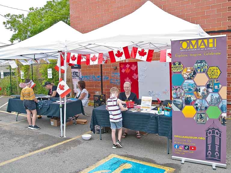 Alair Homes and OMAH"S 'make art' booths At Couchiching Craft Brewing