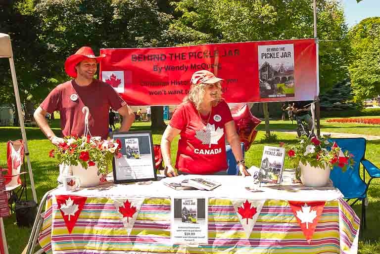 2024 Canada Day author Wendy McQuaig and son, Orillia councillor Jay Fallis, promoting Wendy's book, Behind the Pickle Jar.