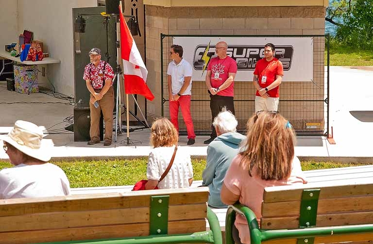 2024 Canada Day Dignitaries (Committee chair Brian Hare, Simcoe North MP Adam Chambers, Orillia councillors Dave Campbell and Jeff Czetwerzuk) line up for their opening ceremony speeches
