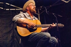 Friday at the Mariposa Folk Festival -  Ben Doerksen on the side stage keeping the audience engaged before Bahamas performed.