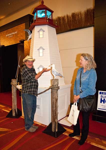 Paul Baxter created a sculpture of a lighthouse, with Carol Castonguay