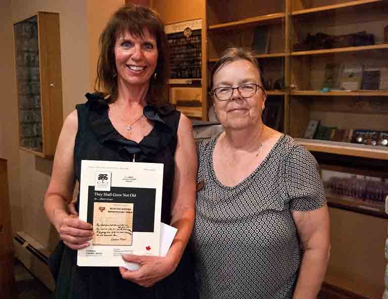 Jean Miso (sang National anthem in Cree, French and English at the church service) thanked by event organizer  Christine Hager.